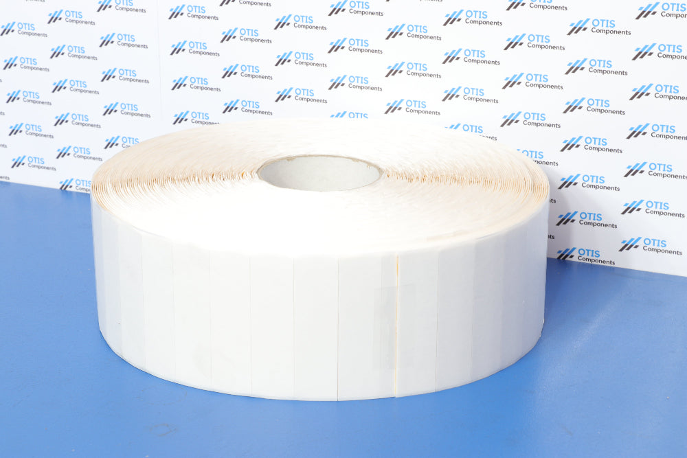 A roll of white adhesive number plate pads