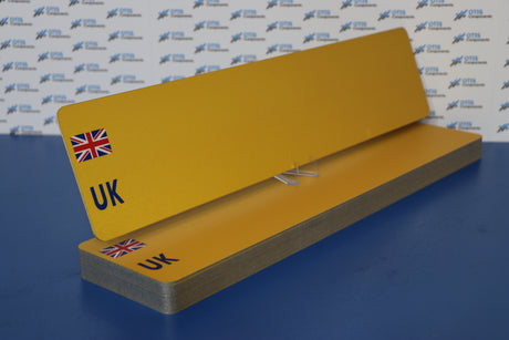 Metatek Substrate Standard Oblong Yellow With UK Travel Flag 520 X 111 (Pack of 25) - Otis Components Number Plates